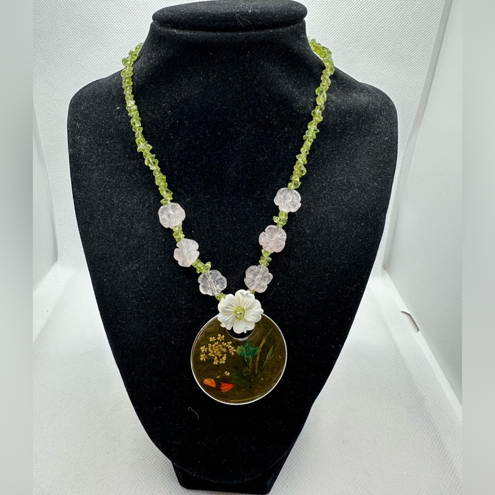 Beautiful peridot gemstone pressed flowers necklace